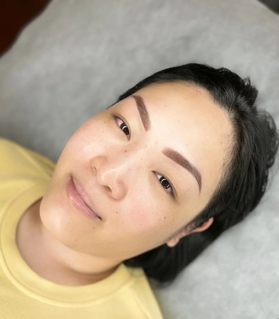 powdered tattooed eyebrows