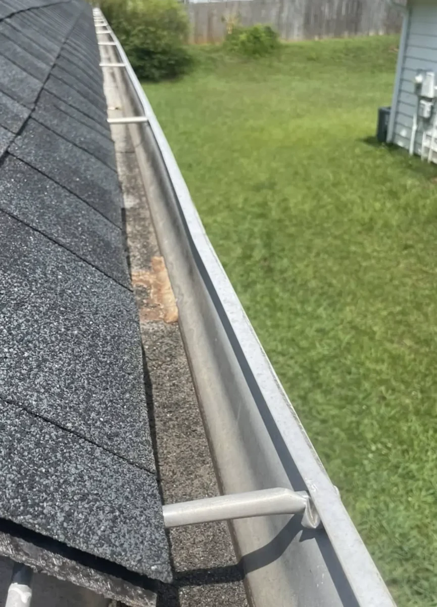 Gutter-and-downpipe-inspection-in-progress-865x1200